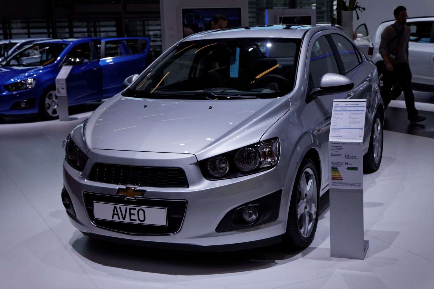Front view of a compact sedan with modern headlights and grille