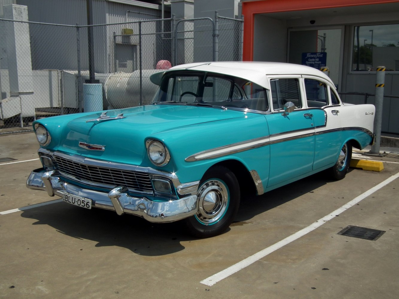 Classic vintage sedan front and side with two-tone paint and chrome detailing