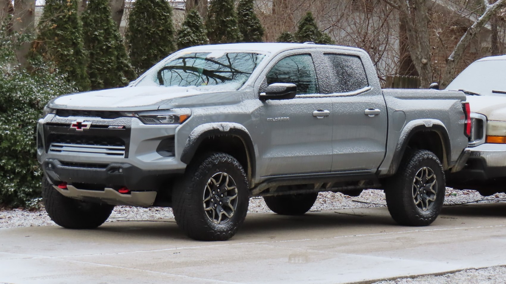 Side view of crew cab pickup with off-road tires