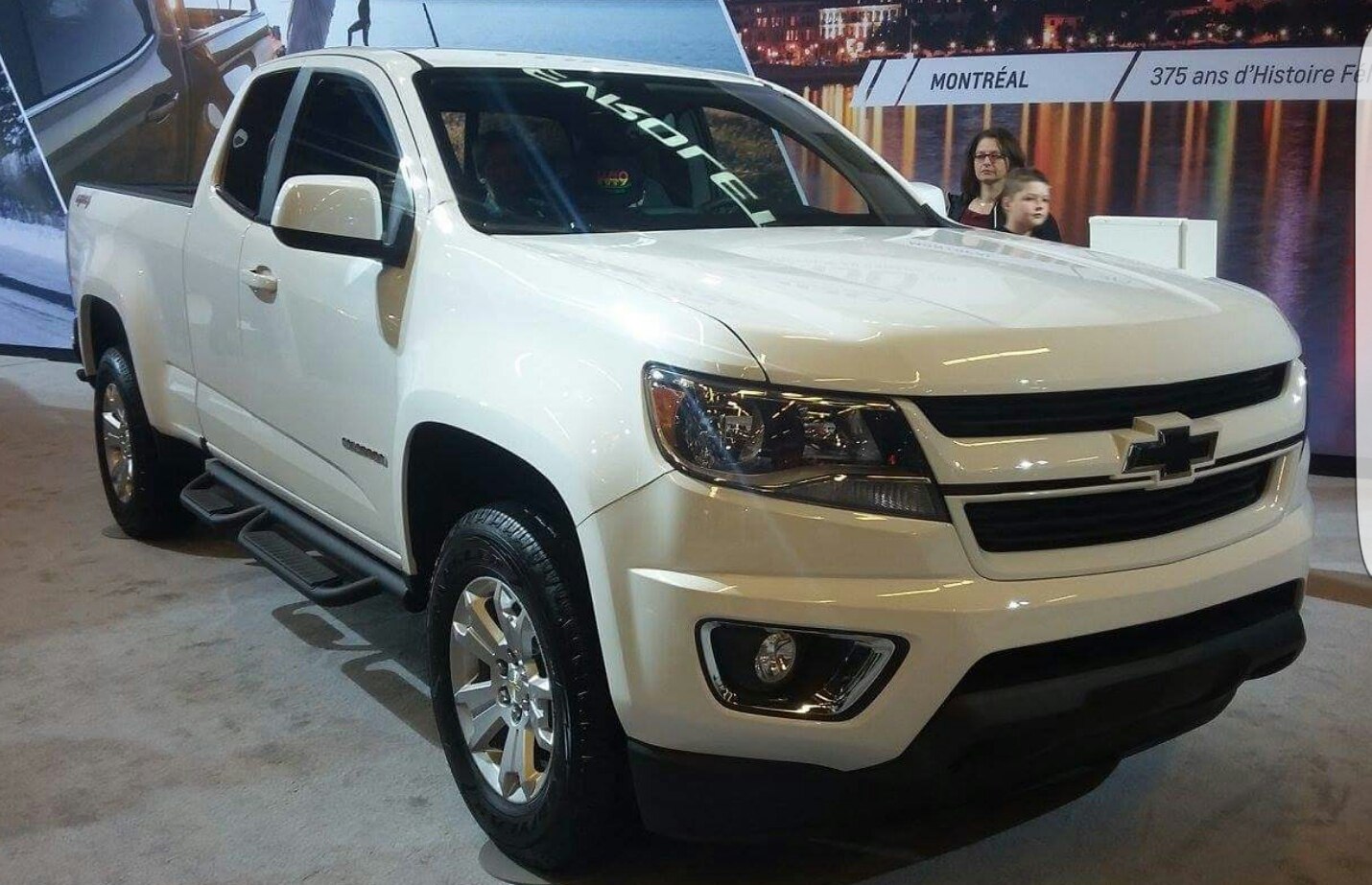 Extended cab long box pickup with side steps and fog lights