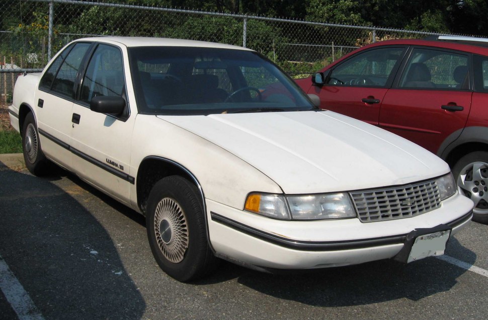 Classic sedan front grille and side profile with four doors