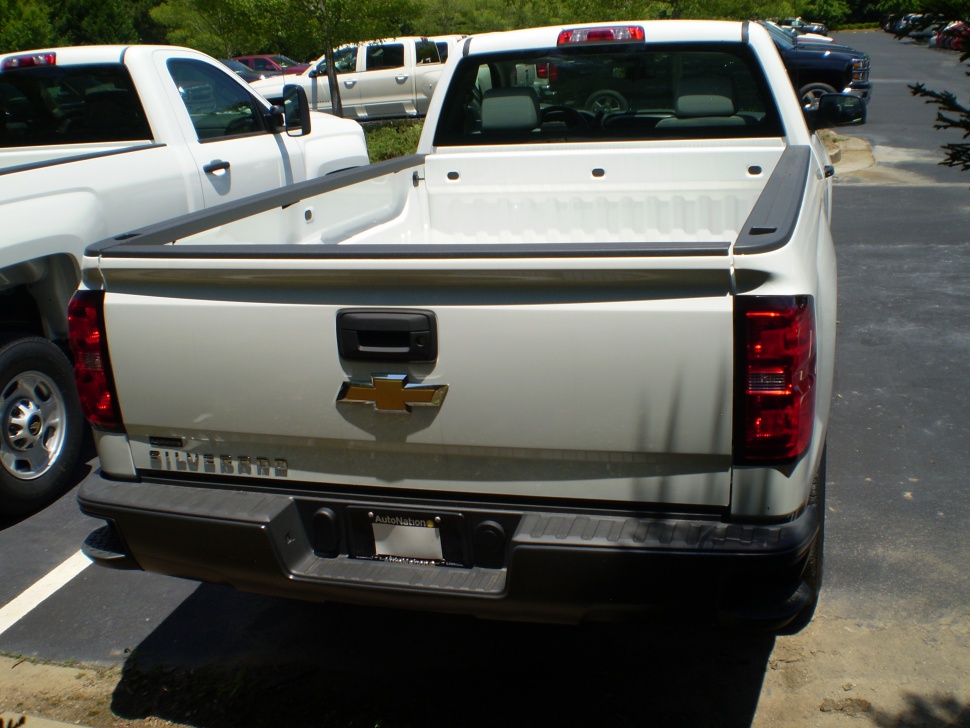 Rear view of pickup cargo bed and tailgate with taillights