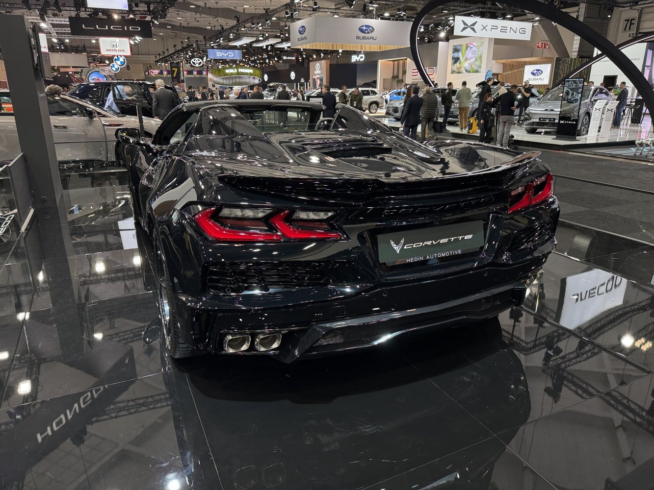 Rear view with distinct taillights and quad exhaust tips