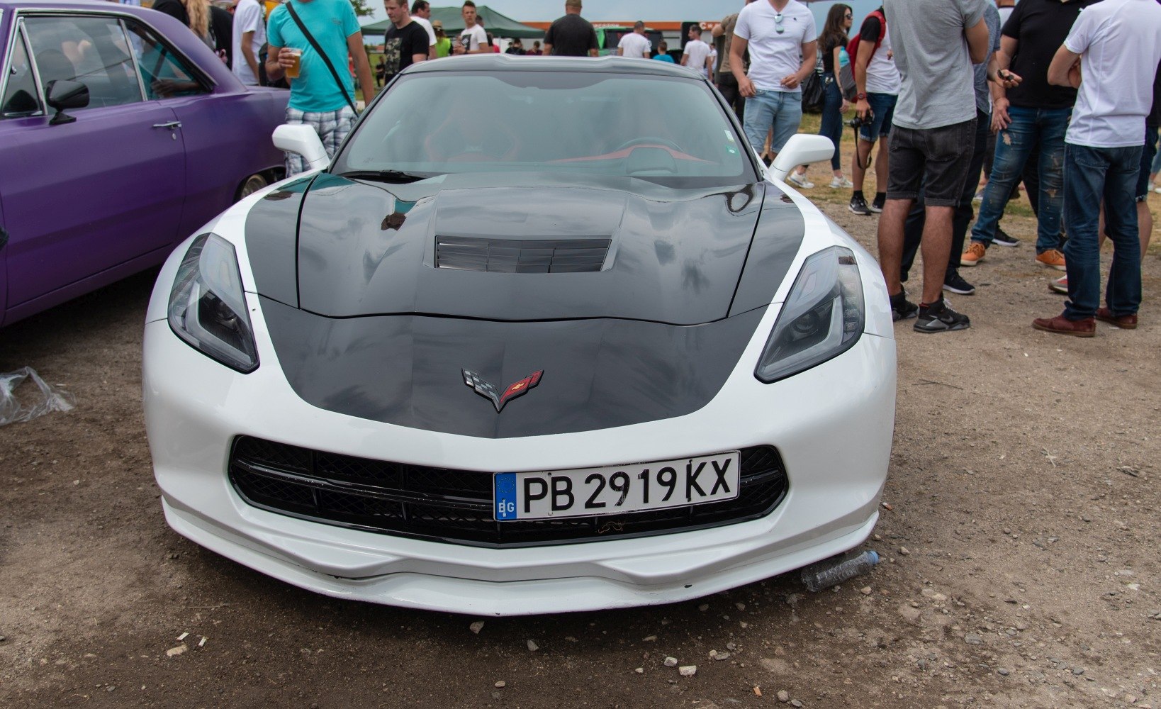 Front view with black hood and sleek headlights