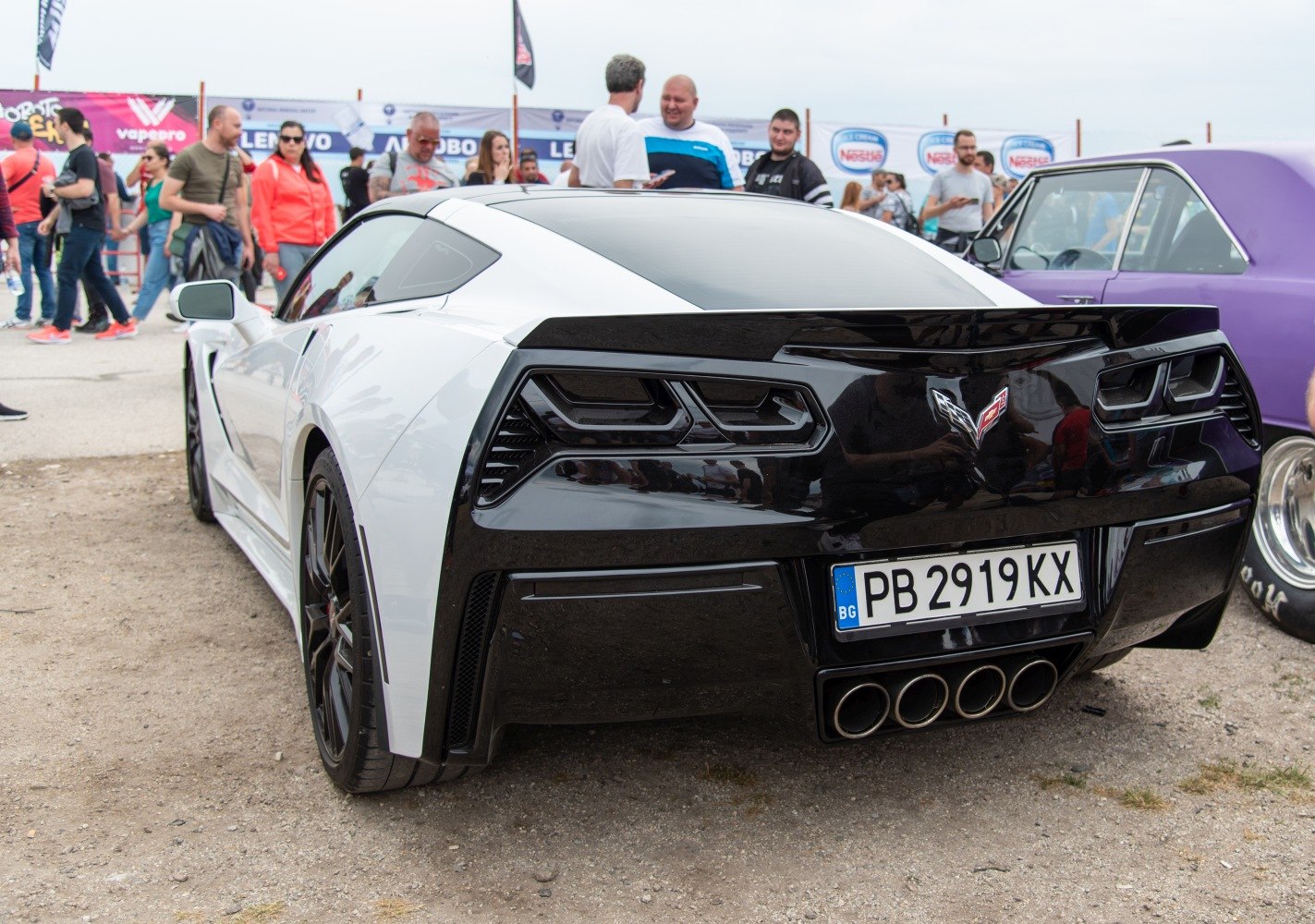 Rear view with quad exhaust and distinctive taillights