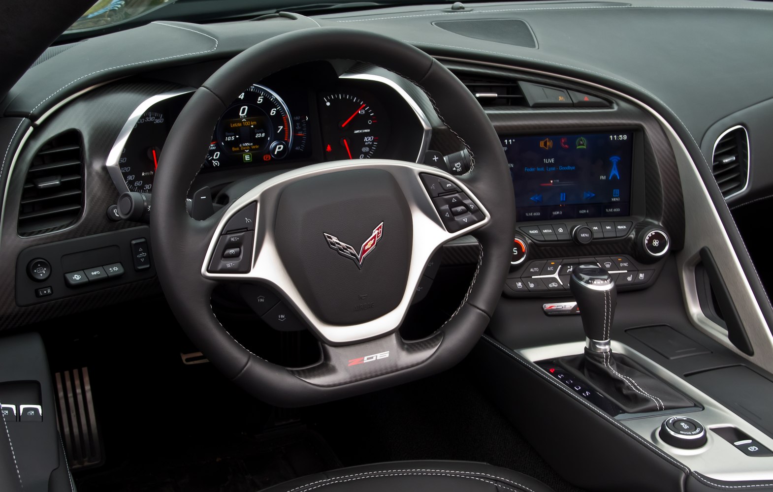 Steering wheel and infotainment system with advanced dashboard.