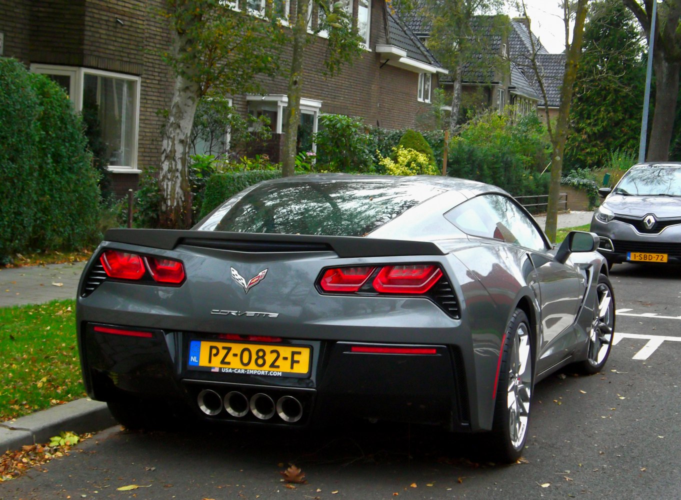 Rear view with quad exhaust and angular tail lights