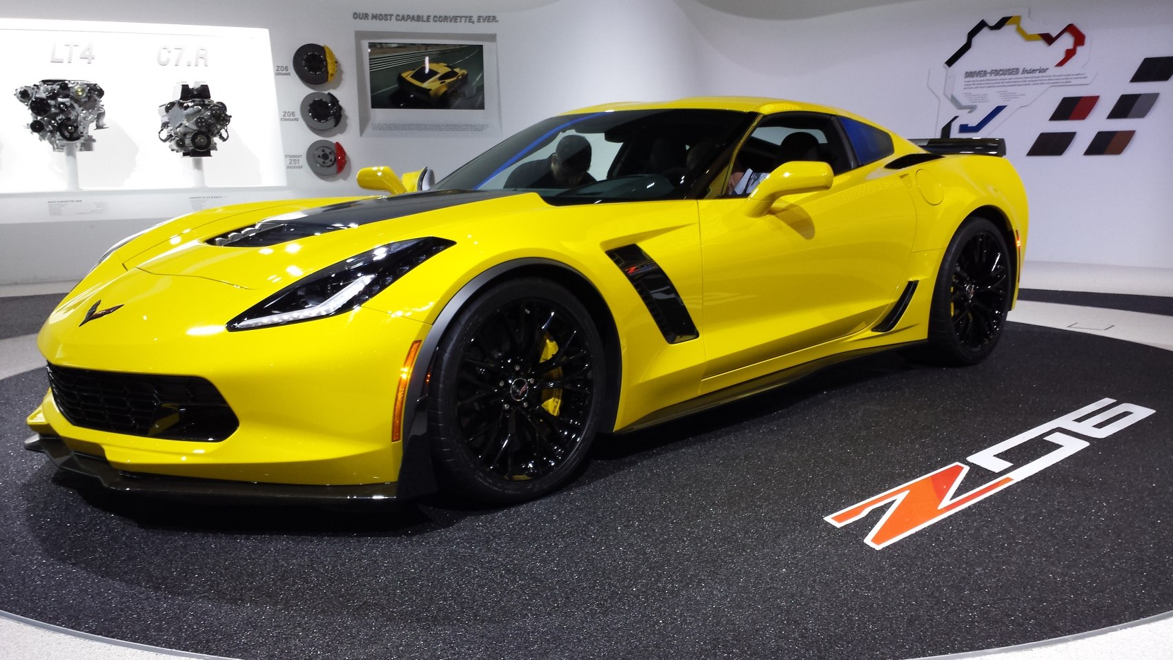 Yellow sports coupe with aerodynamic shape and black wheels