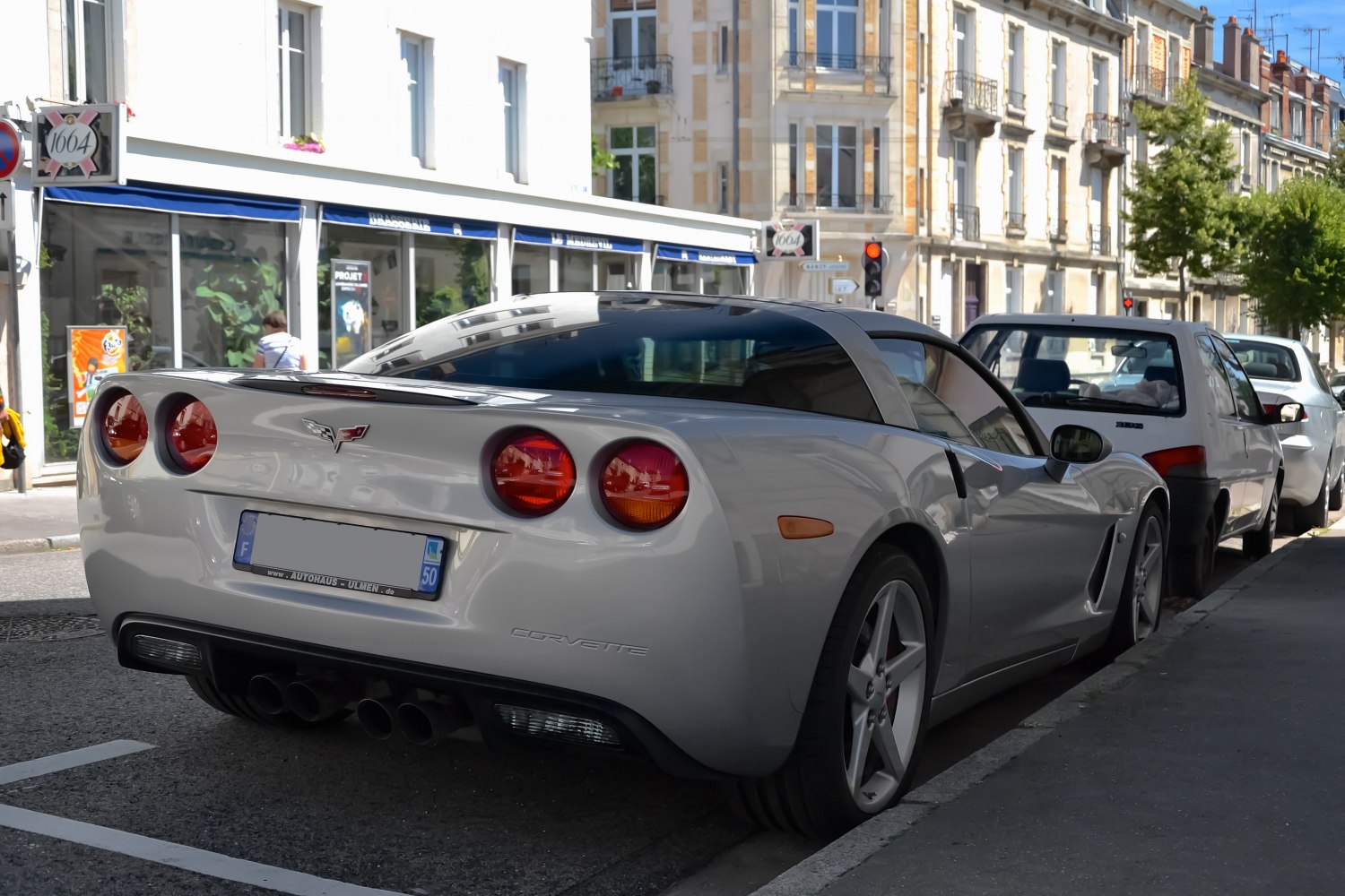 Rear view with quad exhausts and round taillights