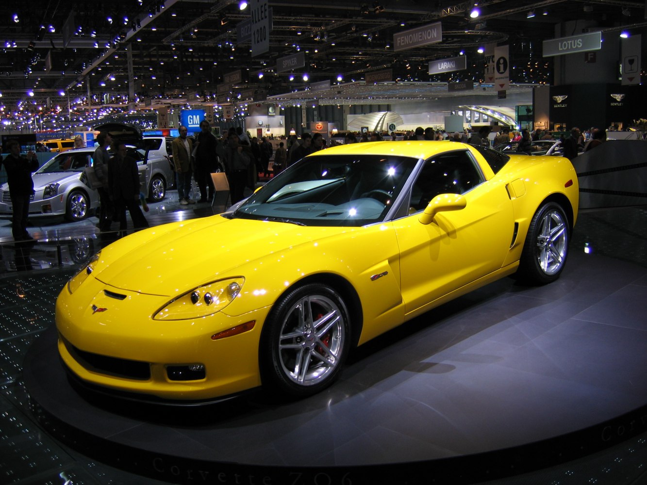 Yellow sports coupe with sleek body and alloy wheels