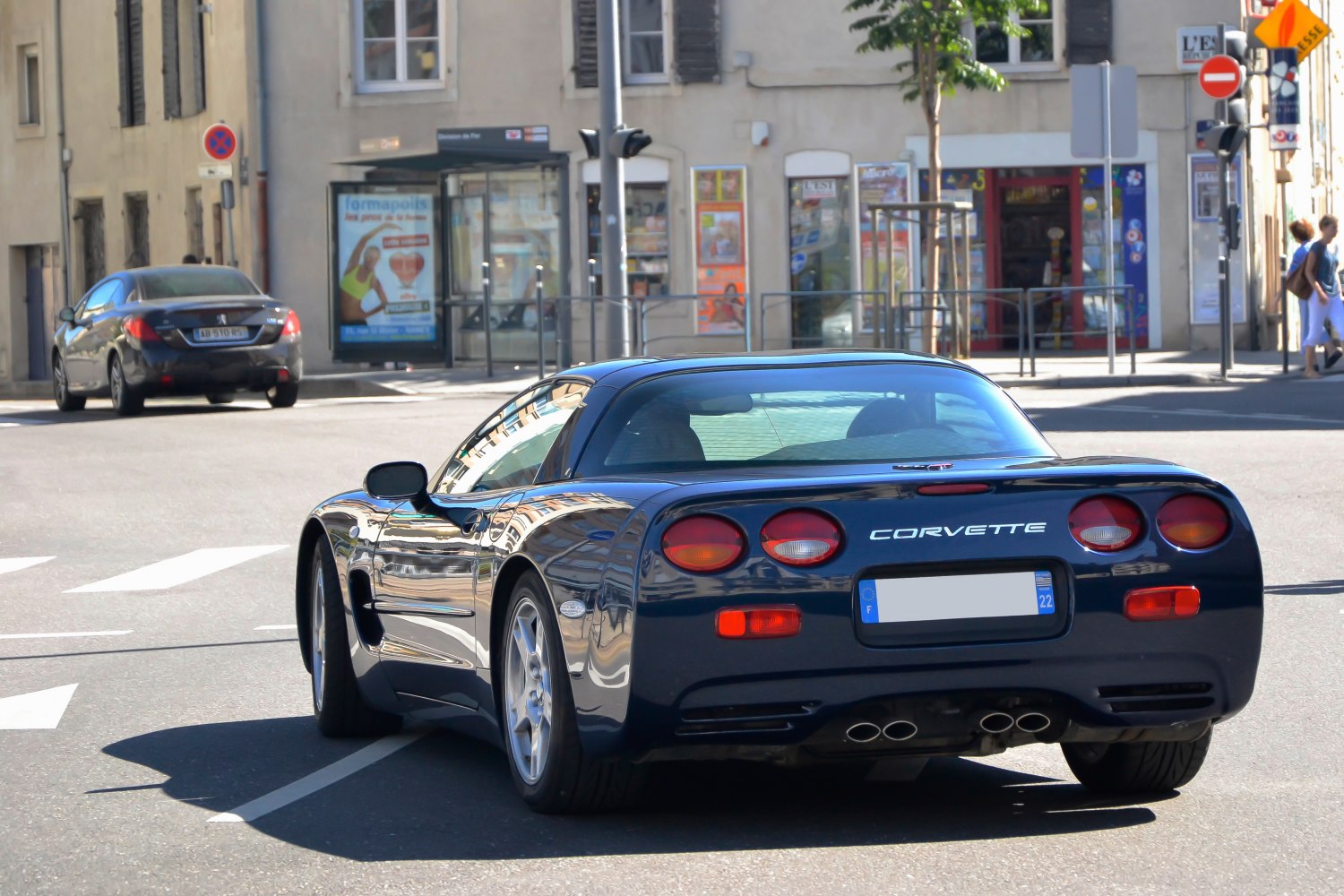 Rear view with quad round taillights and dual exhausts