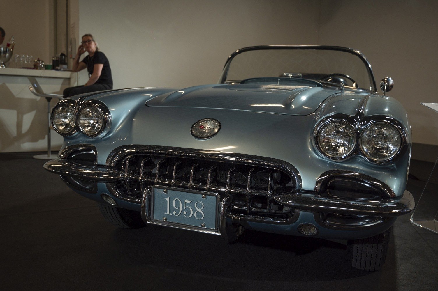 Front view with dual round headlights and chrome grille
