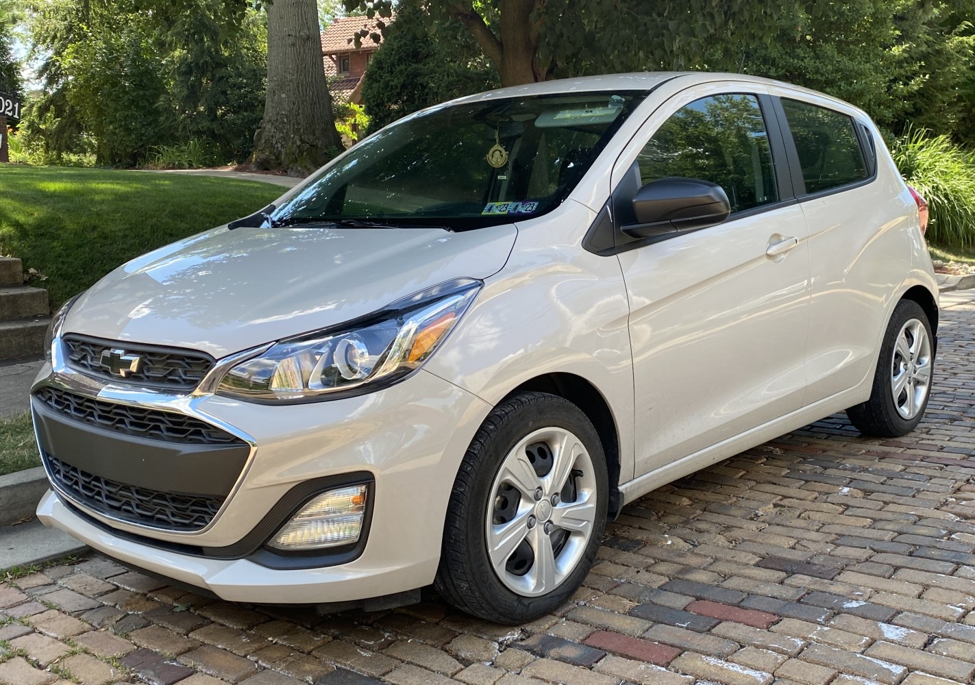Compact hatchback with sleek headlights and prominent grille