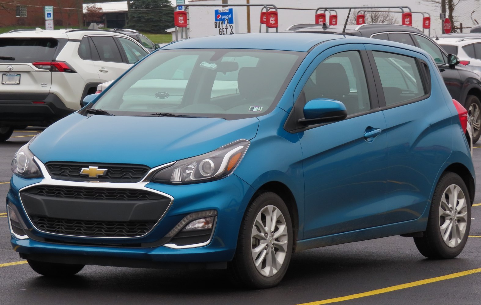 Blue compact hatchback, front fascia and side profile