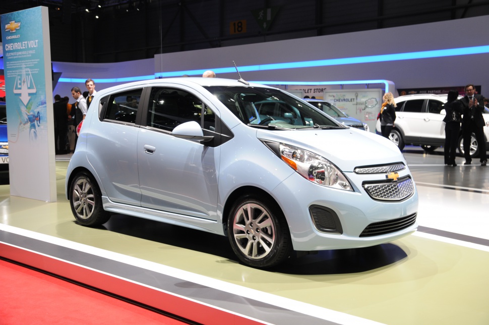 Compact electric hatchback front side view with distinctive grille