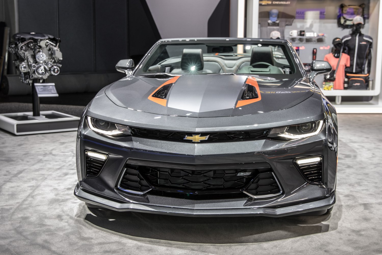 Front fascia with aggressive headlights and sporty hood vents