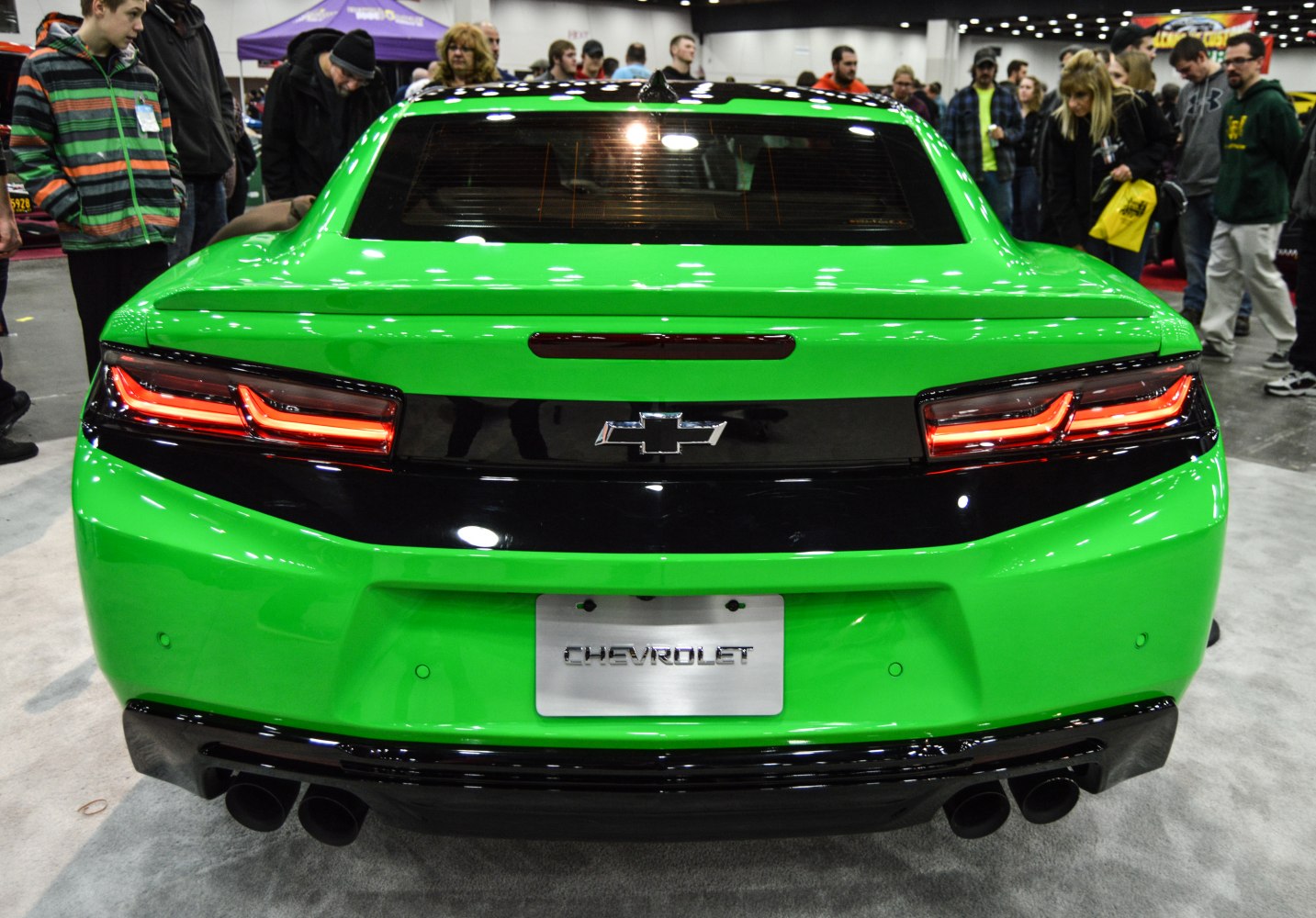 Dual LED tail lights and black rear panel with quad exhaust tips