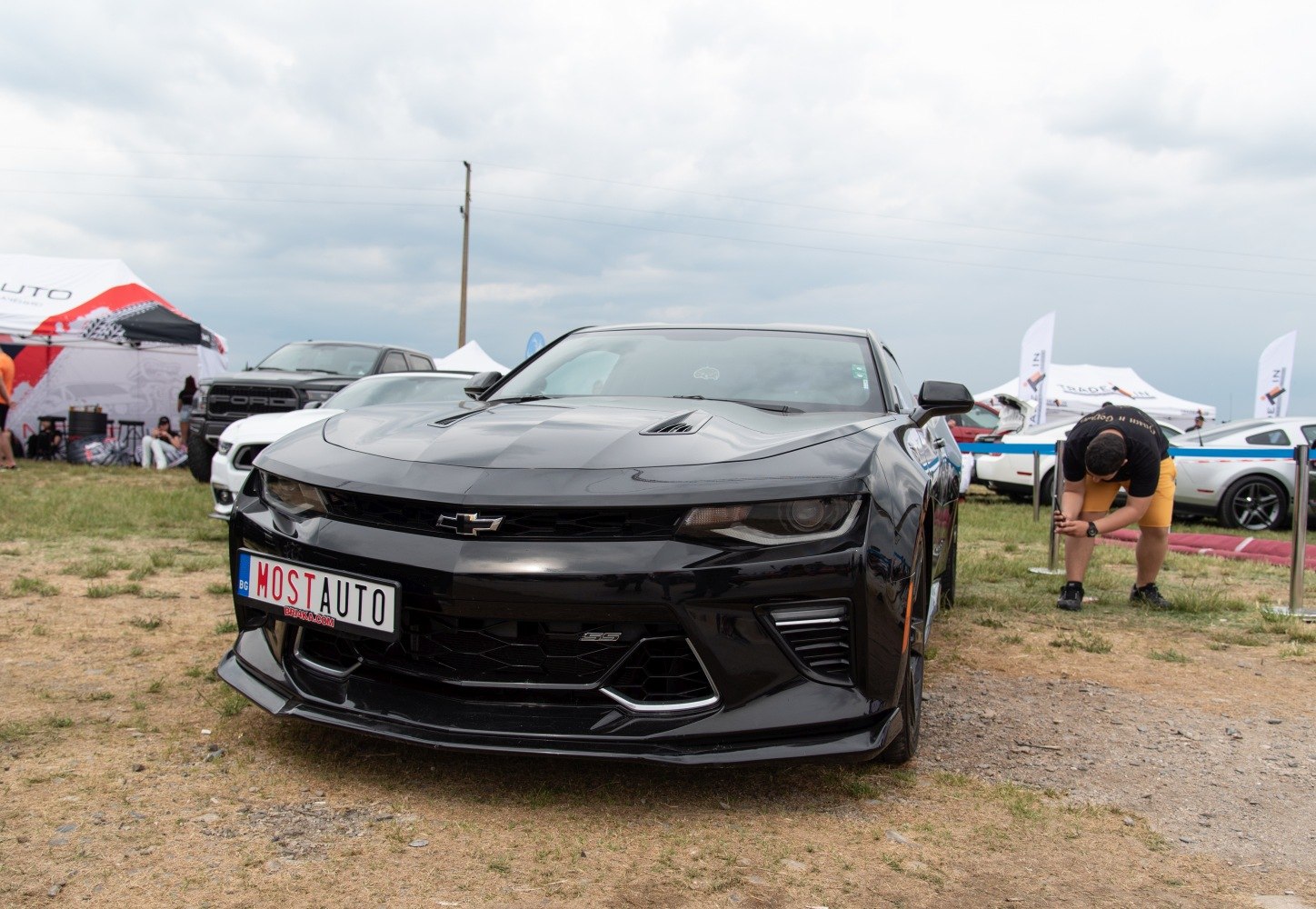 Aggressive front fascia with sporty grille and hood vents