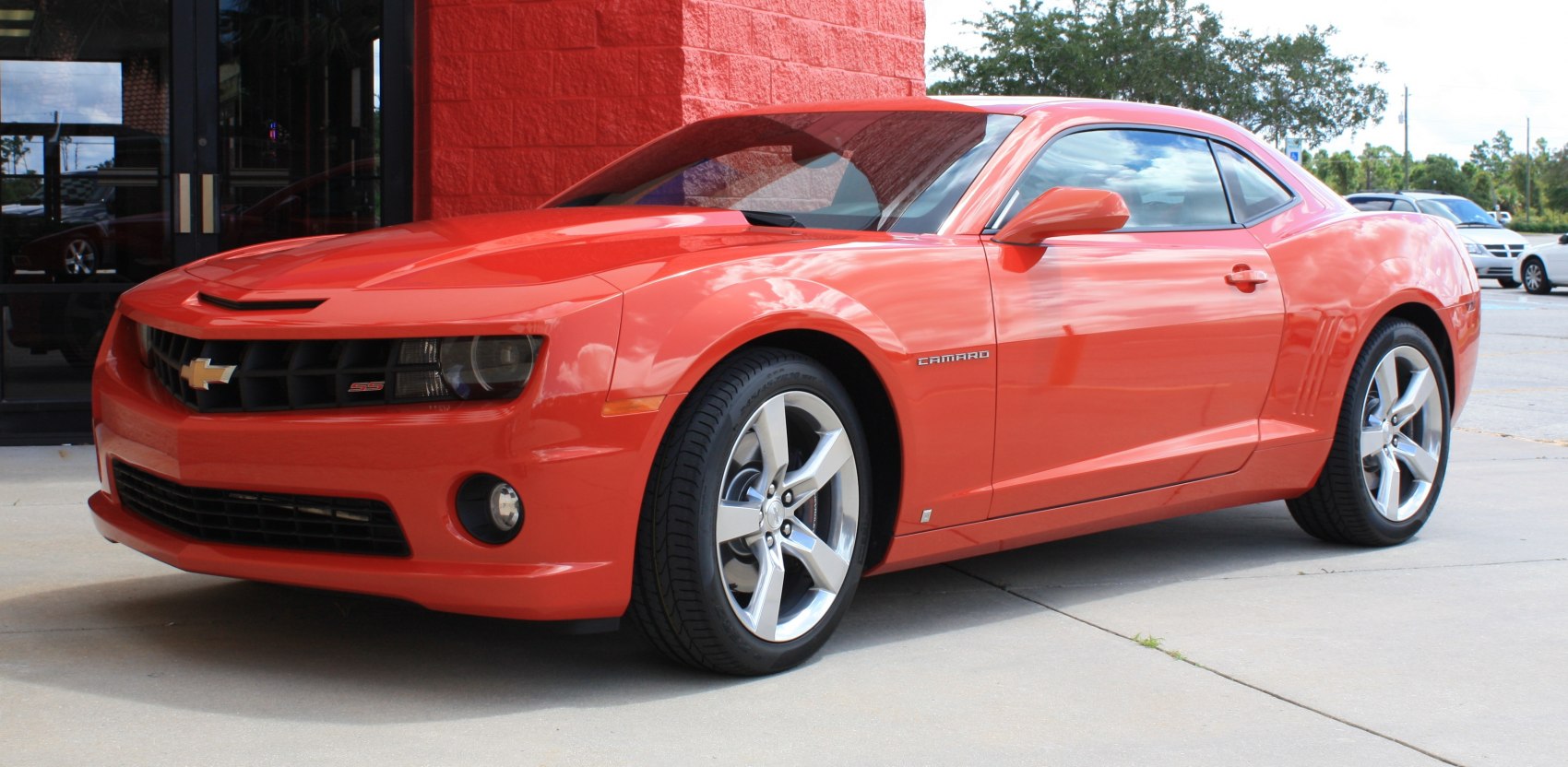 Sports coupe front view with SS badge and alloy wheels