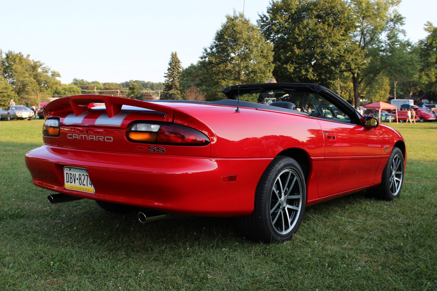 Convertible rear view with spoiler and dual exhaust