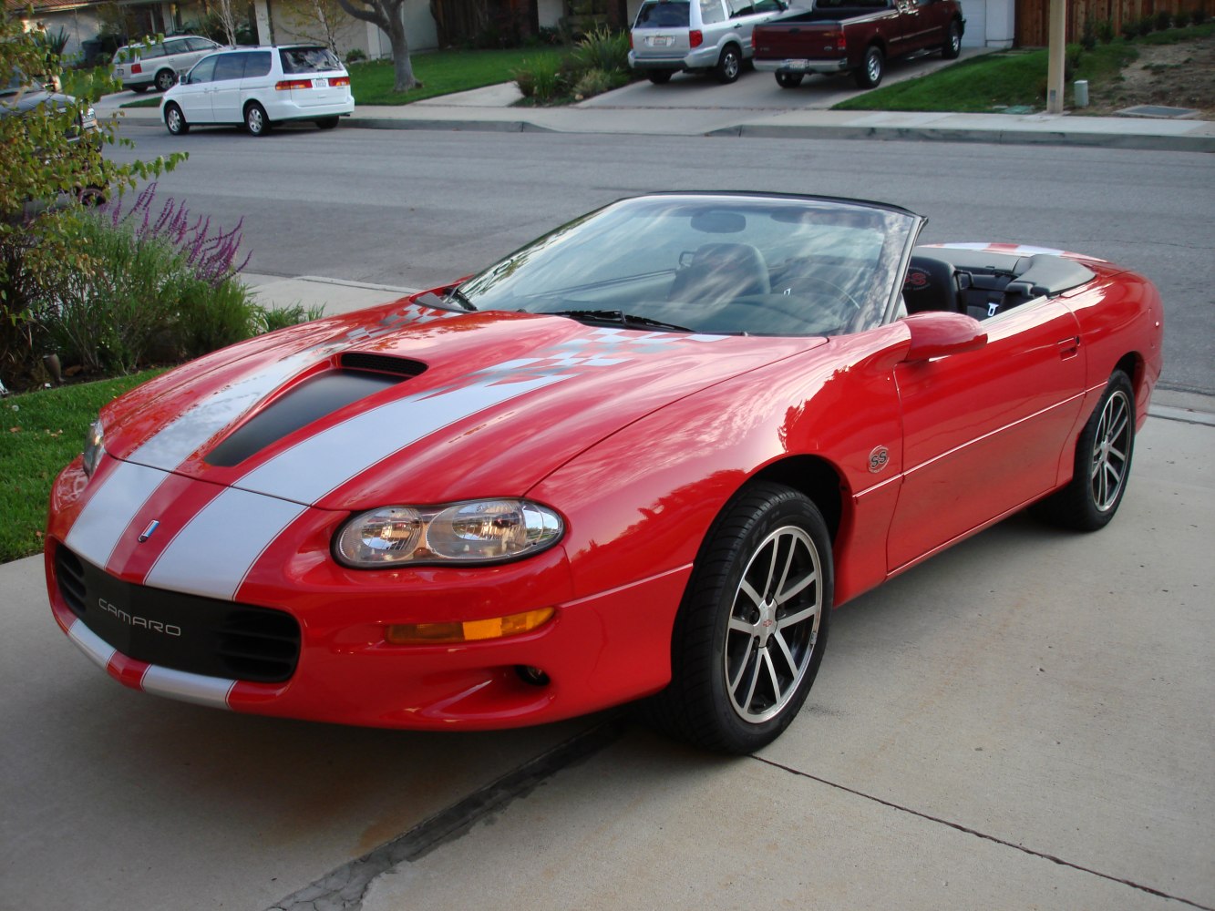 Convertible with hood scoop and dual racing stripes