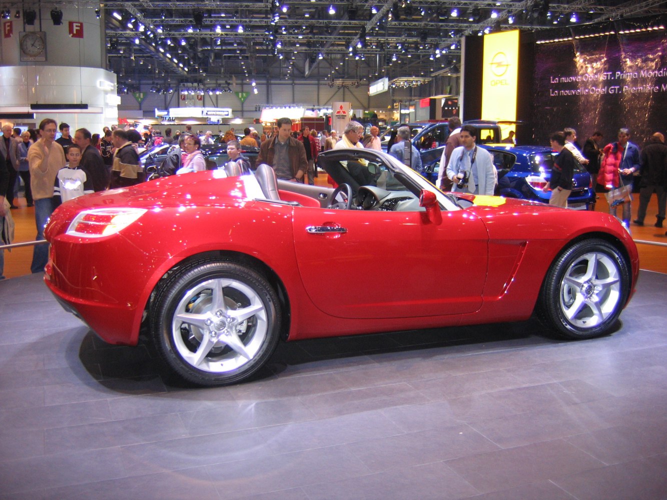 Red convertible roadster with alloy wheels