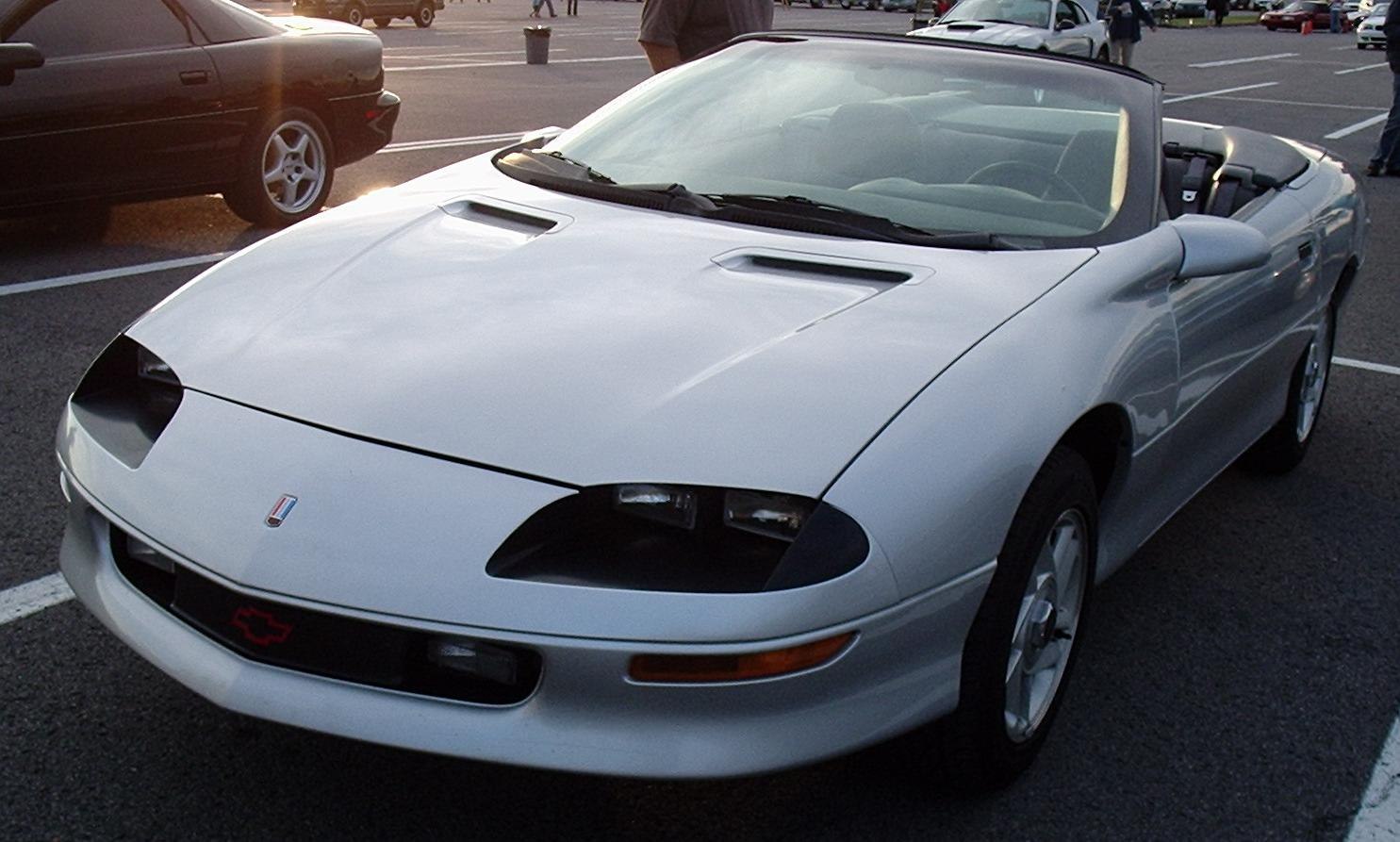 Convertible with pop-up headlights and dual hood vents