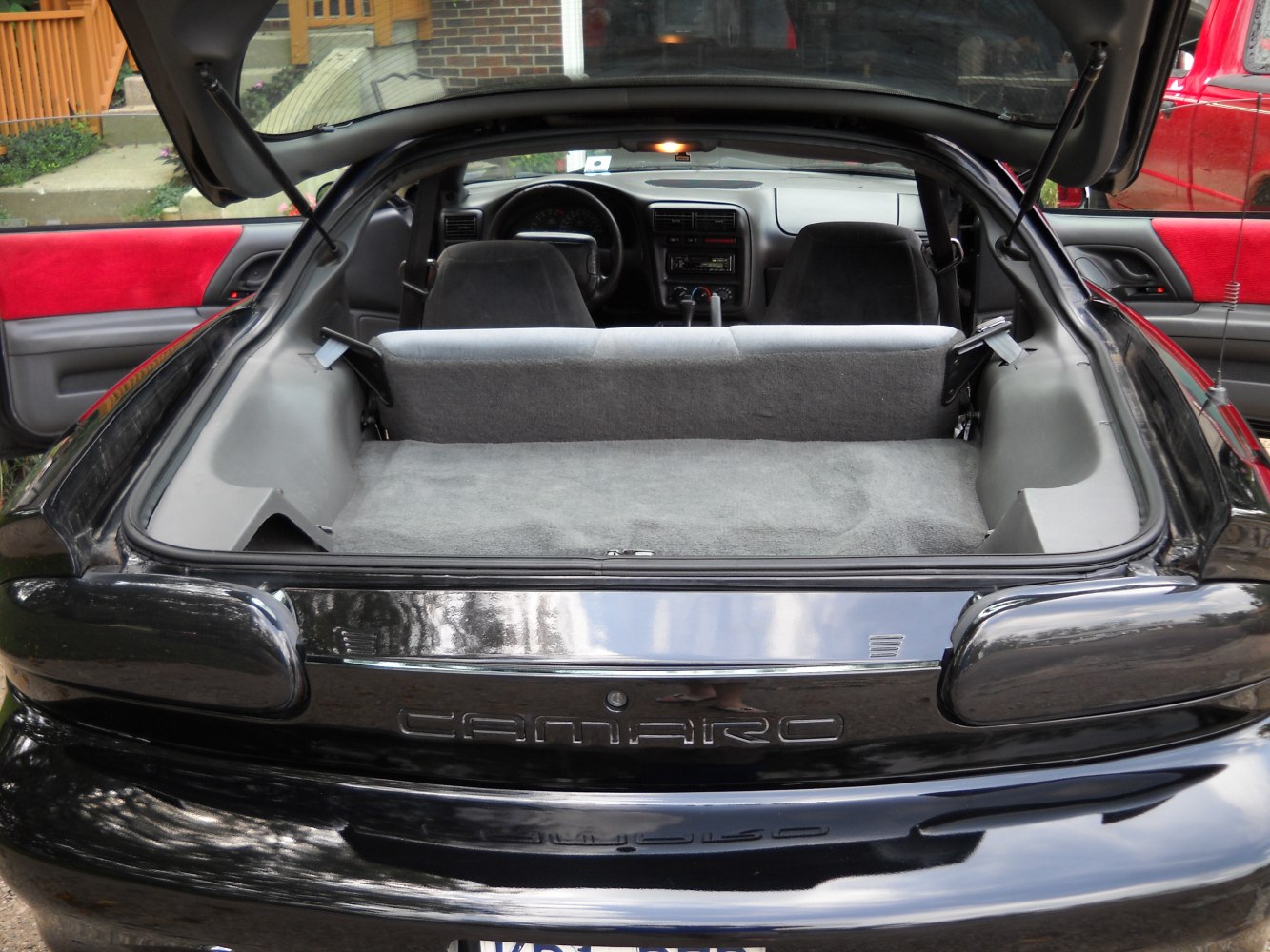 Rear hatch interior with cargo space and rear seats view