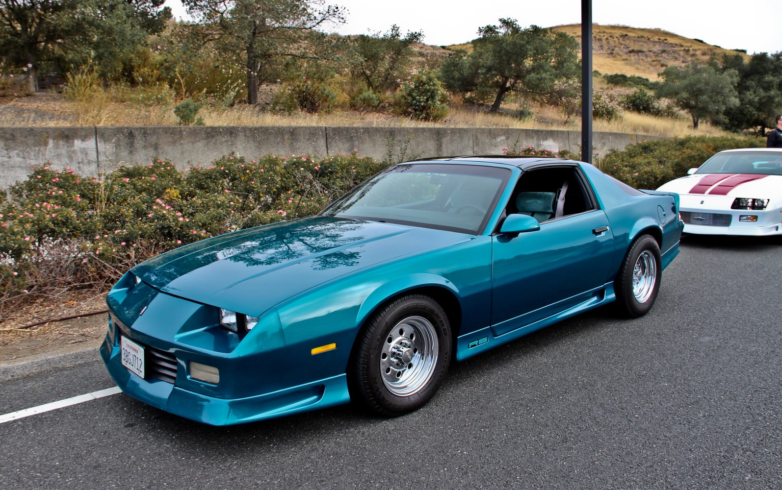 1991 RS coupe with pop-up headlights and sporty body styling