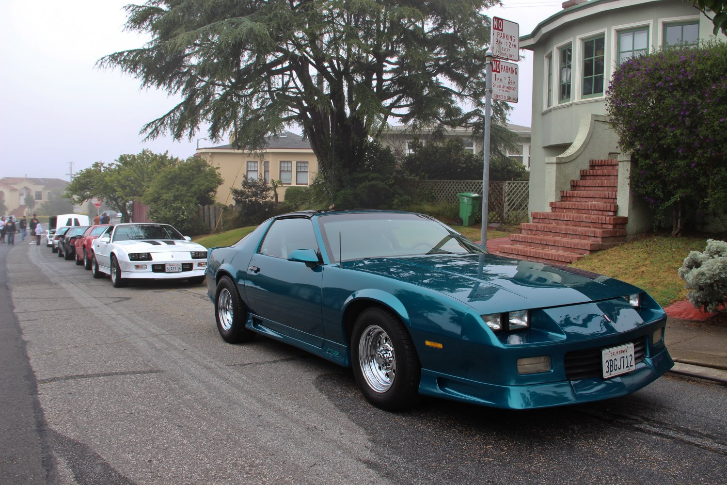 Blue 1991 Camaro with T-top roof and polished alloy wheels