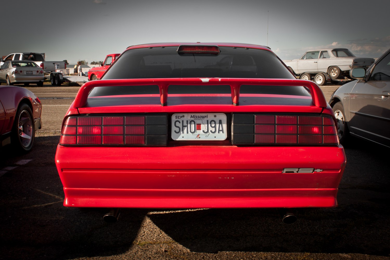 Red rear with distinctive spoiler and taillights