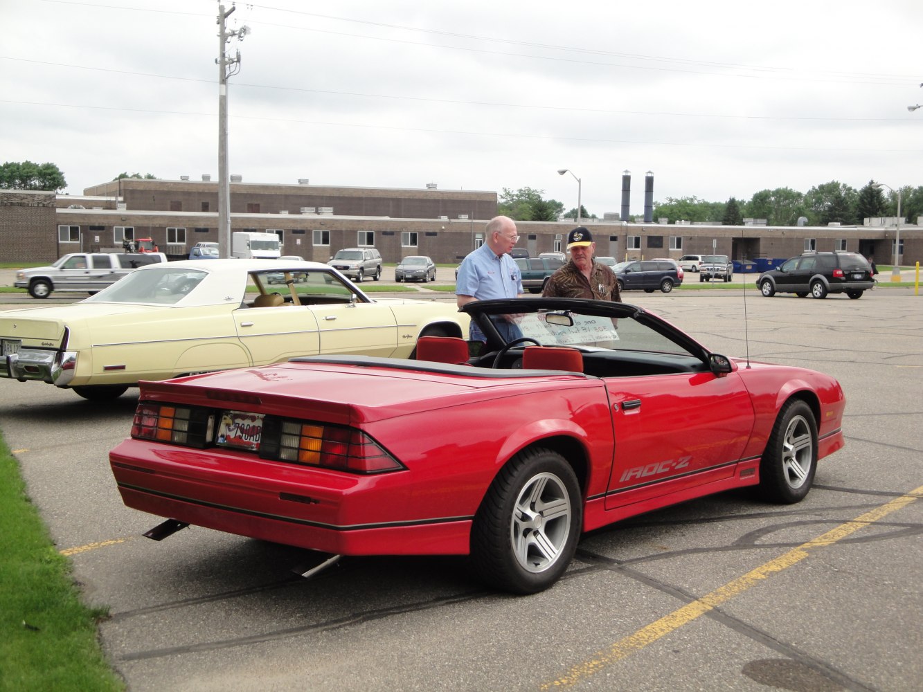 Red convertible with distinct taillights and IROC-Z side decal