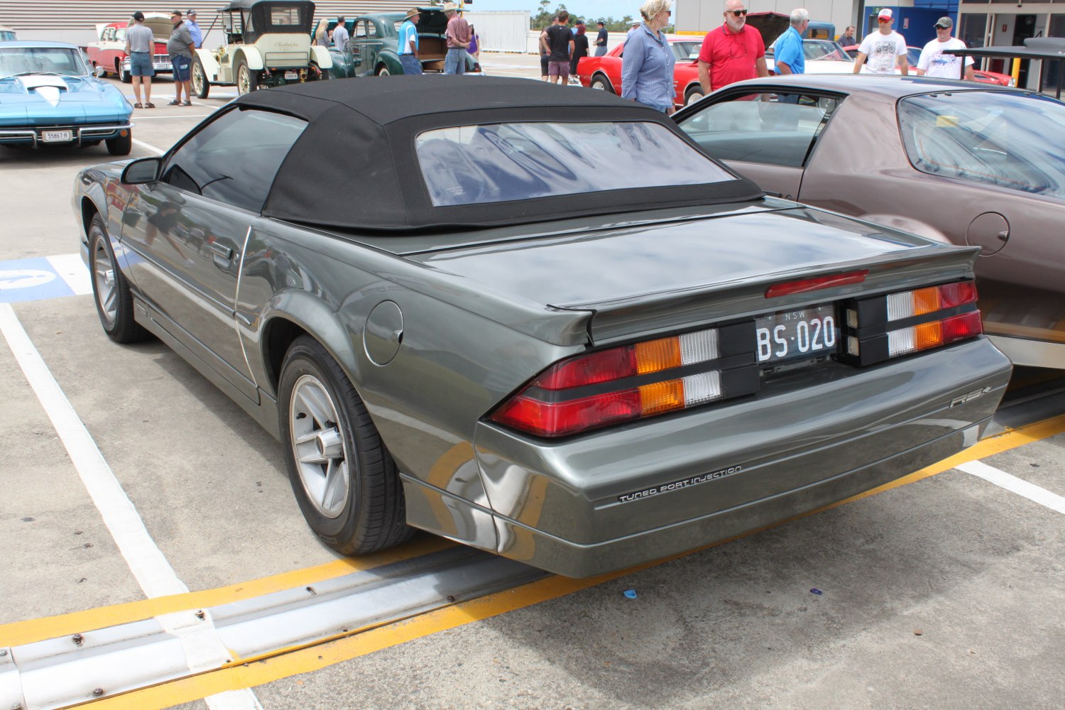 Rear view of a convertible with soft top and distinct taillights