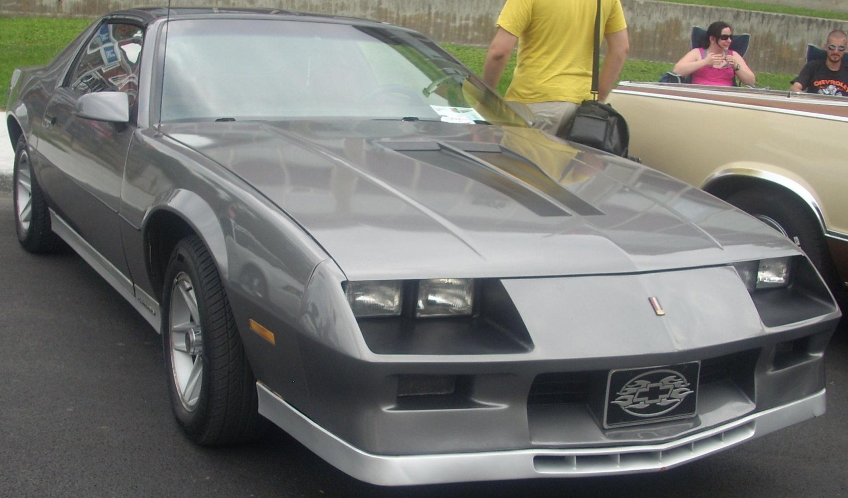 Dual rectangular pop-up headlights and aerodynamic sharp-edged front end.