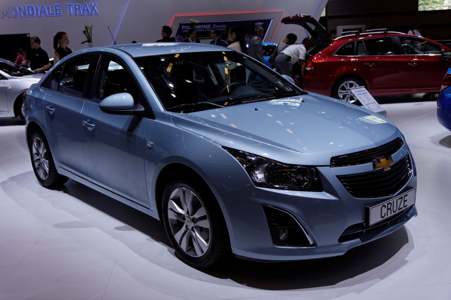 Front view showing updated grille and headlights on a sedan.