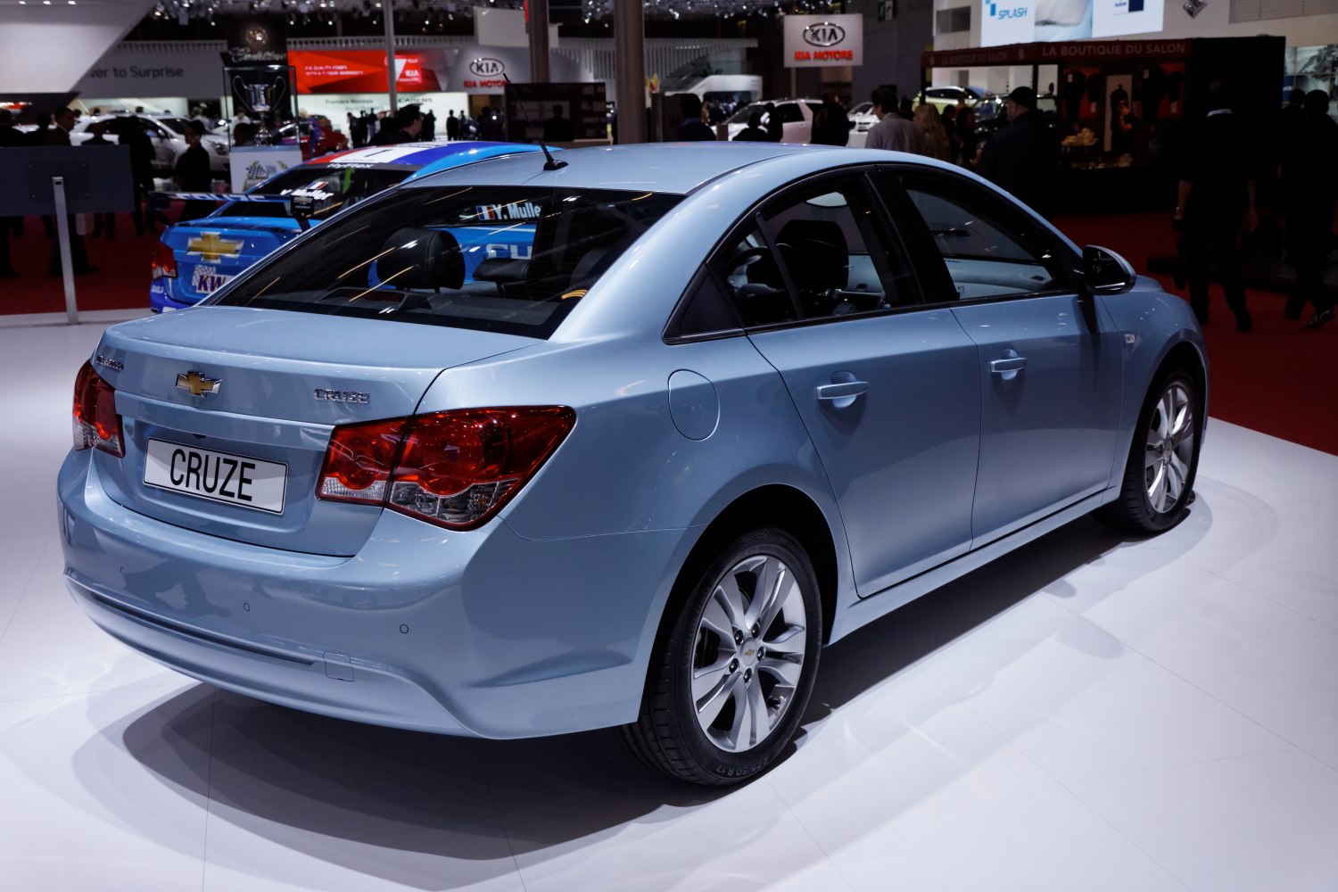 Rear and side view of a modern sedan with distinctive tail lamps and sleek design