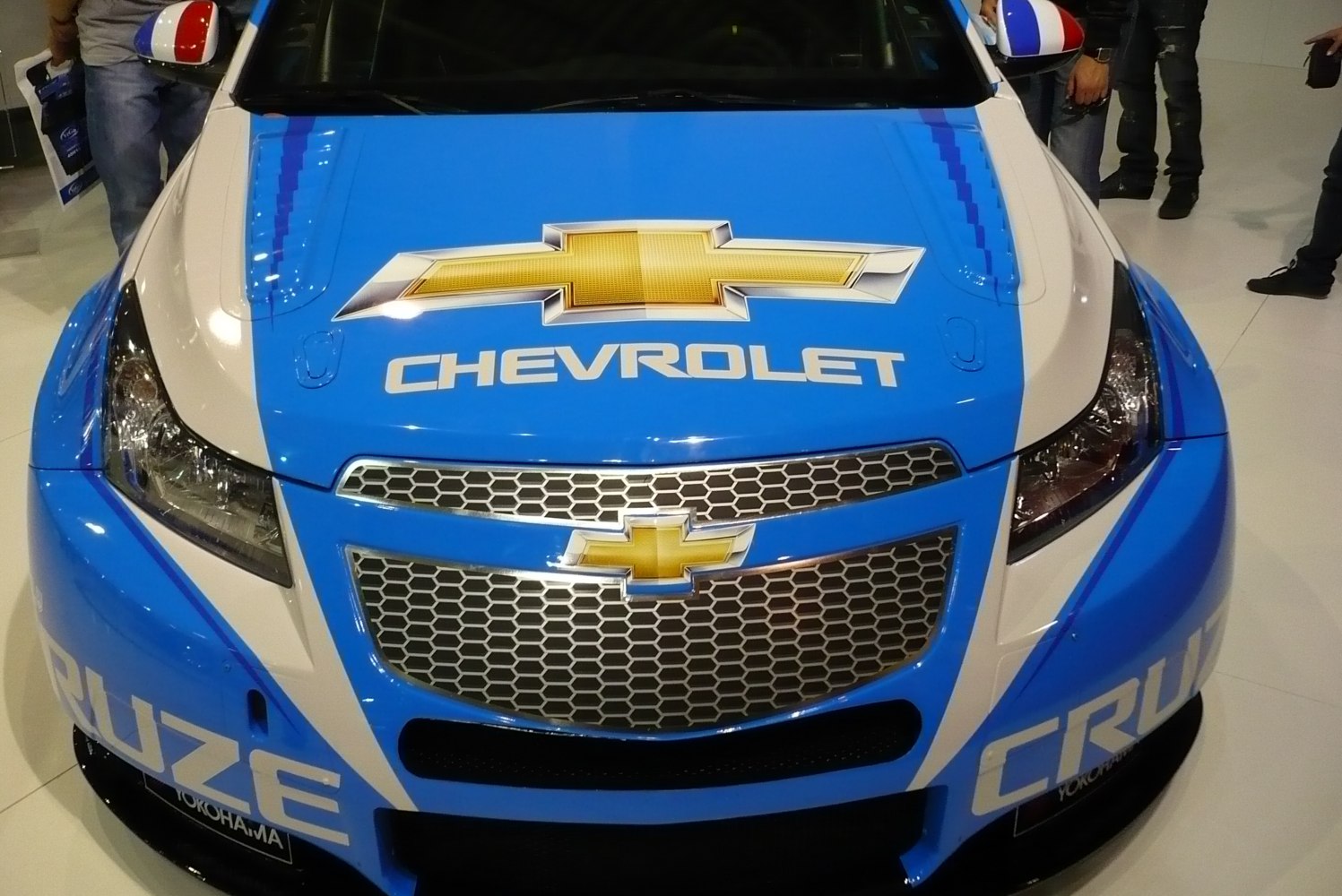 Blue and white racing hood and front grille with Chevrolet emblem