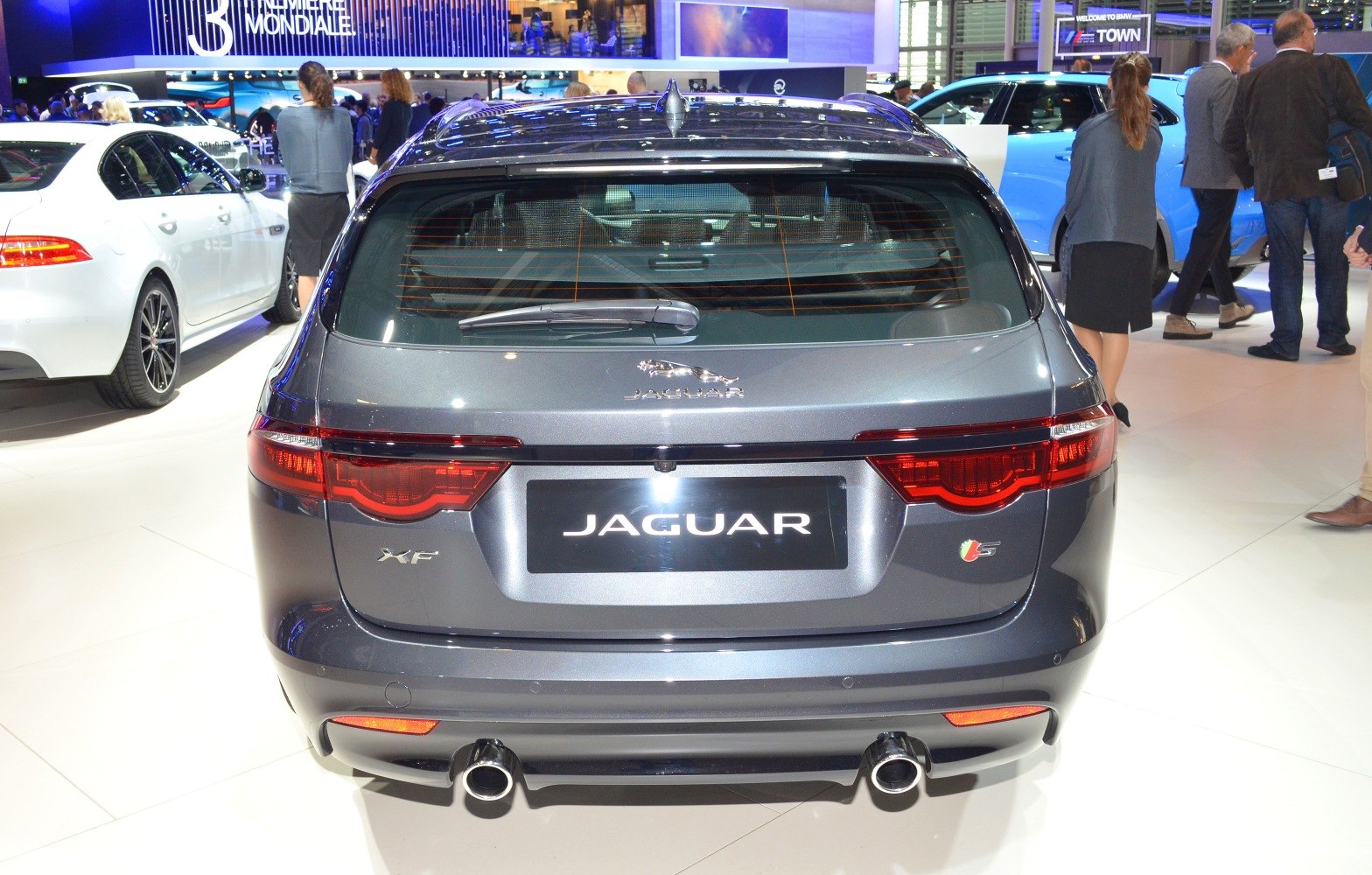 Rear view of station wagon with dual exhausts and distinctive taillights