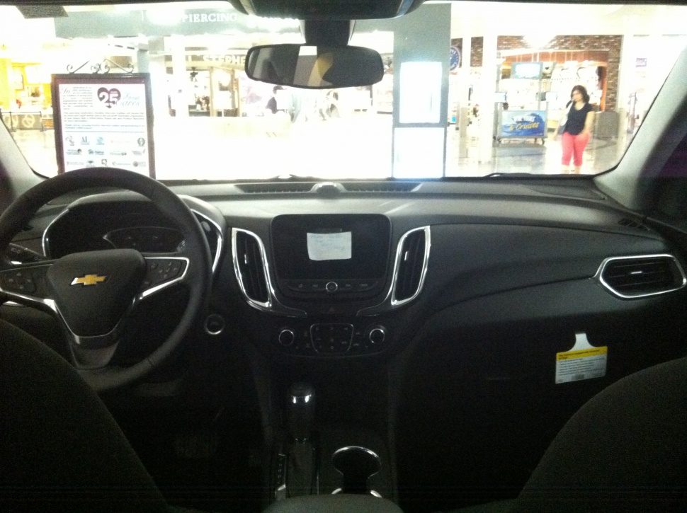 Dashboard with infotainment screen and multifunction steering wheel