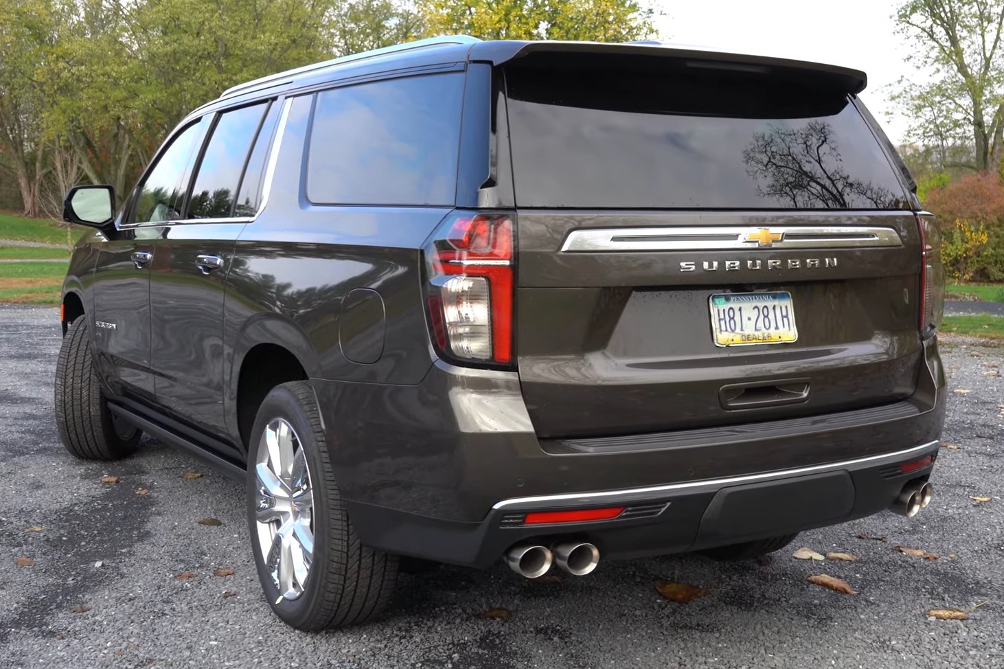 Rear view of an SUV with dual exhaust and tinted rear windows