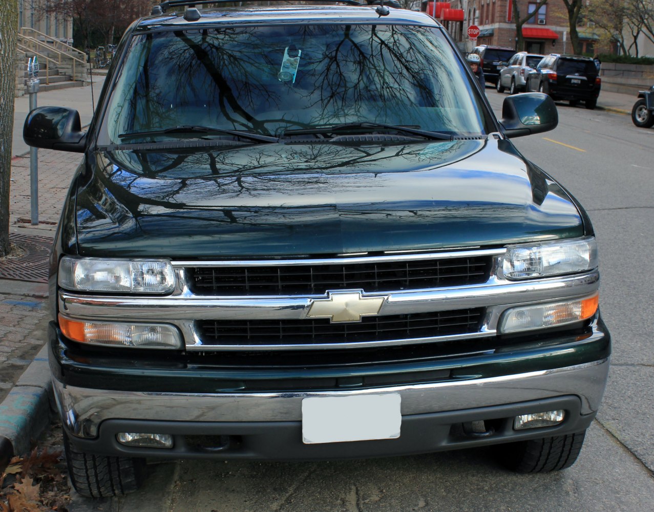 Front view showing grille and headlights of a classic SUV