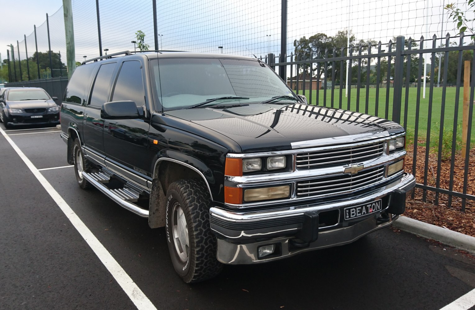 Rugged full-size SUV with chrome grille and off-road tires