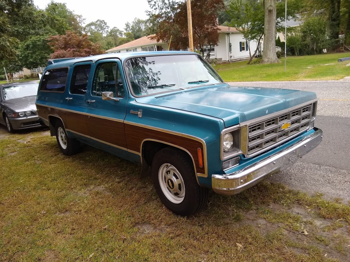 Vintage SUV with wood paneling and chrome grille