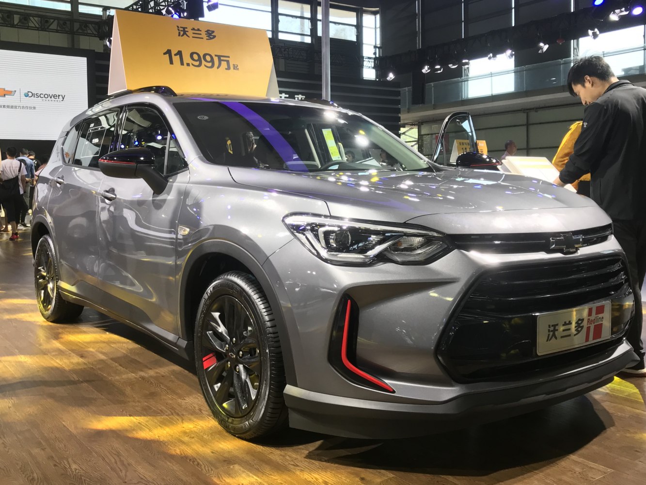 Front-side view with LED headlights and black alloy wheels.