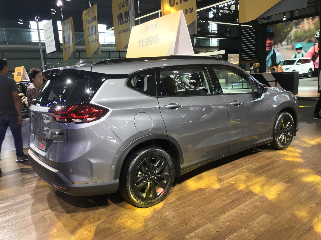 Compact SUV rear side view with sleek design and black alloy wheels