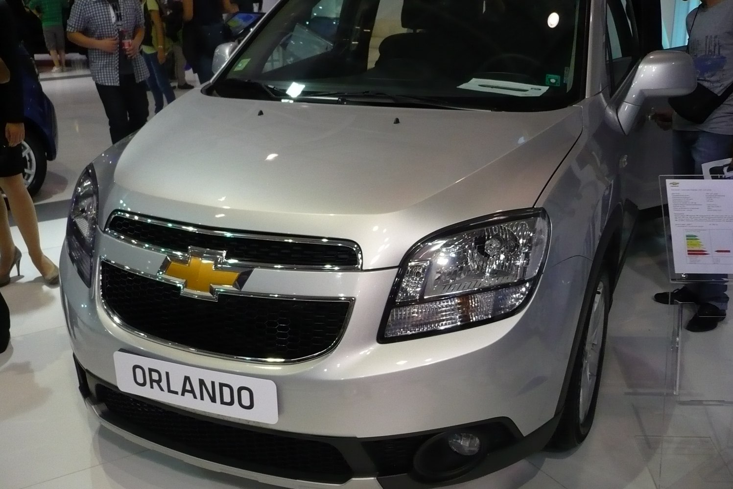 Silver front view with grille, headlights, and fog lights