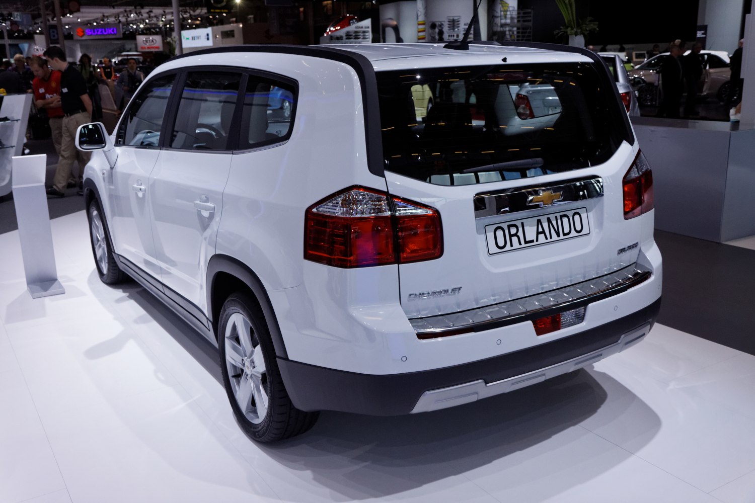 Rear and side profile with clear taillights and SUV design