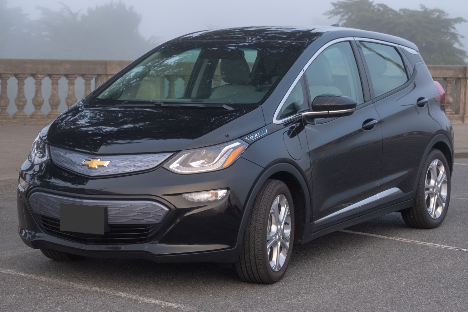 Electric hatchback with modern headlights and aerodynamic profile