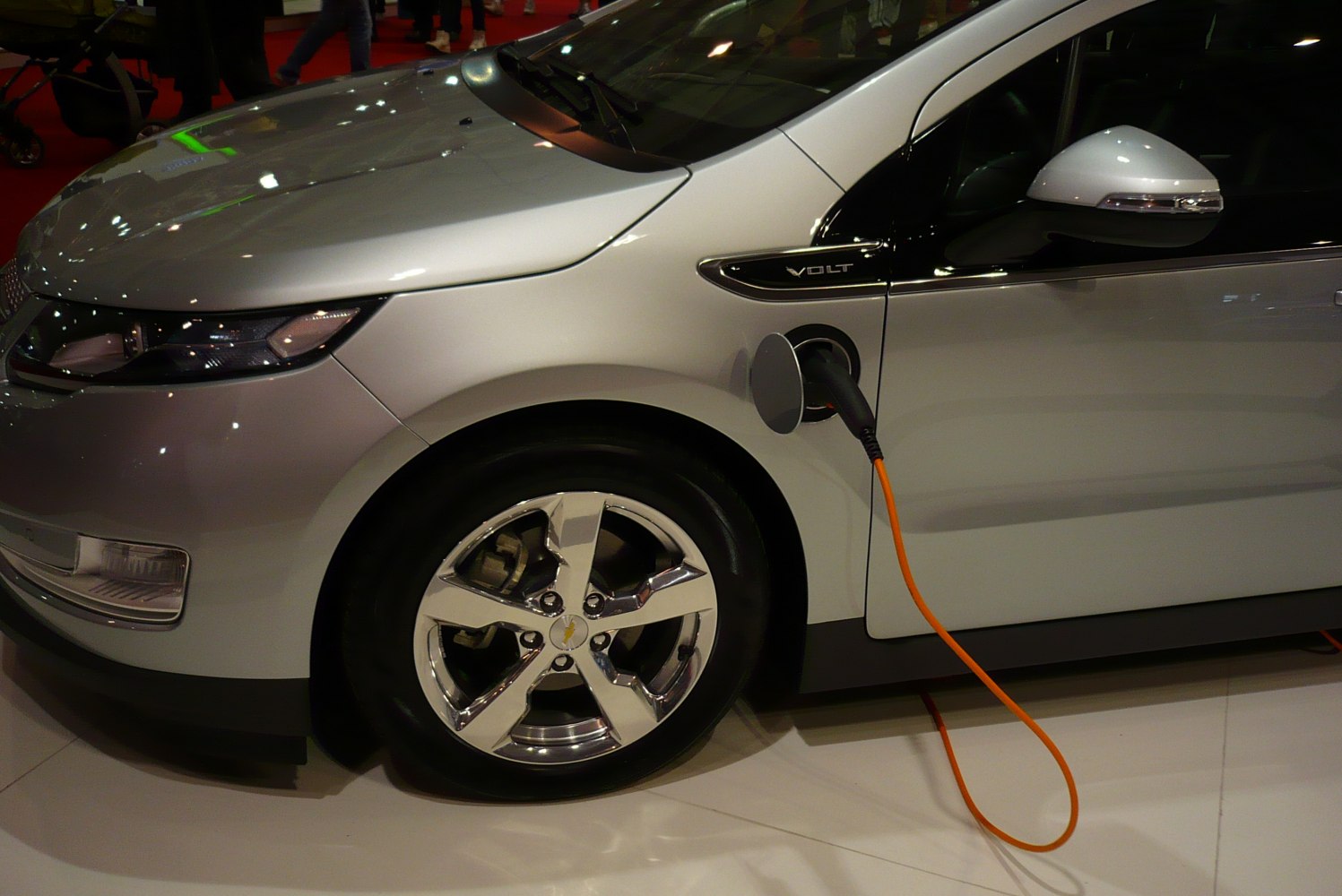 Electric charging port and front wheel with alloy rim