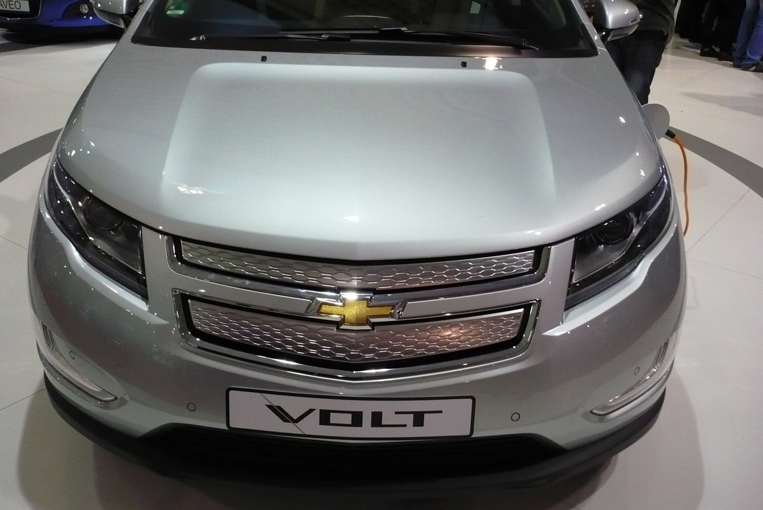 Front grille and headlights with charging port cable